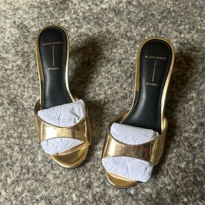 Black Suede Studio gold heel